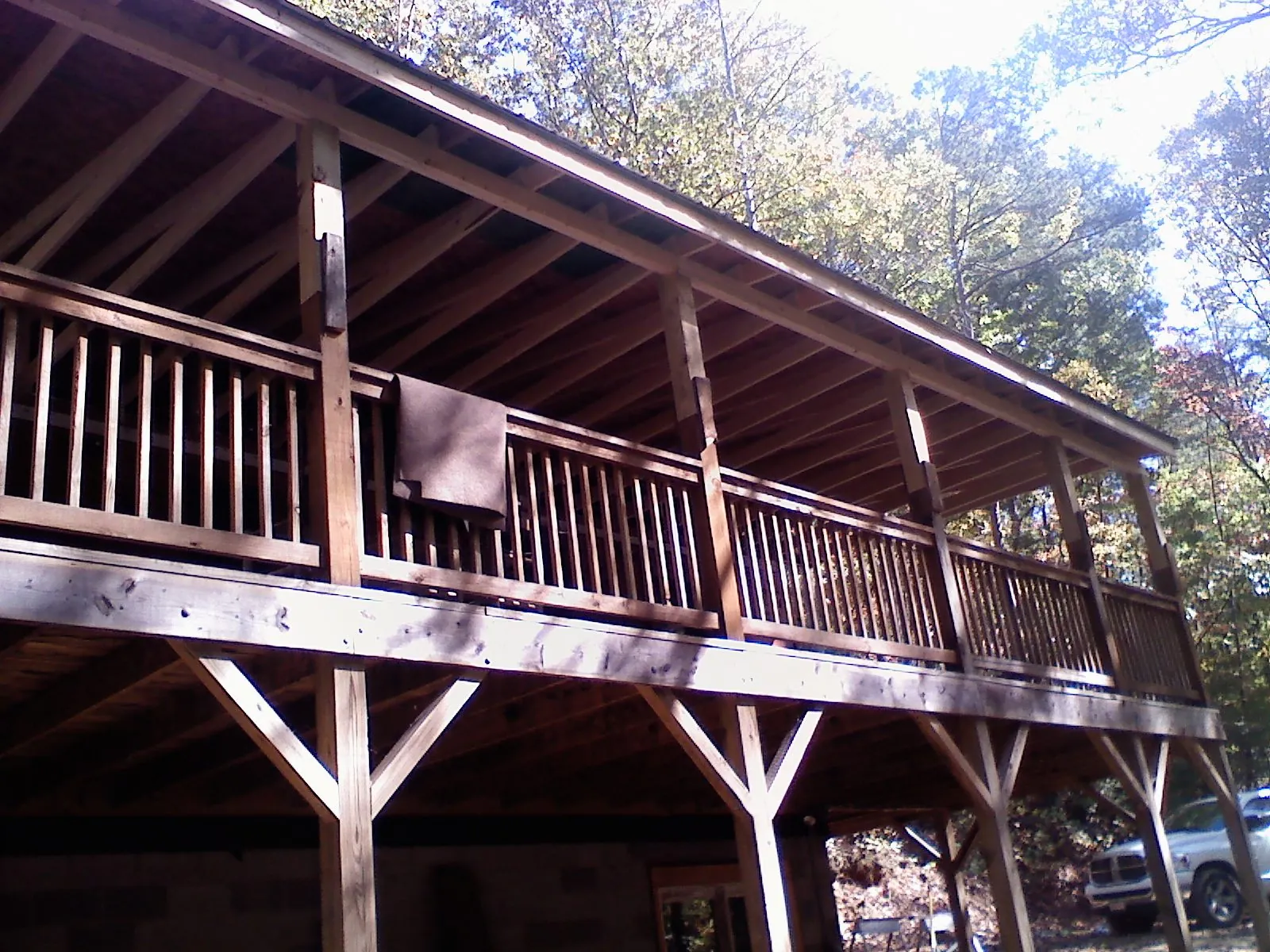 Timber framing under a new elevated porch and deck — Roof Leak Repair in Grenada by Roofing Brothers